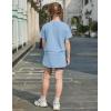 Arshiner Girls 2 Piece Outfits Summer Clothes Short Sleeve Drop Shoulder Shirt and Skirt with Built-in Shorts Athletic Sets(Light Blue)
