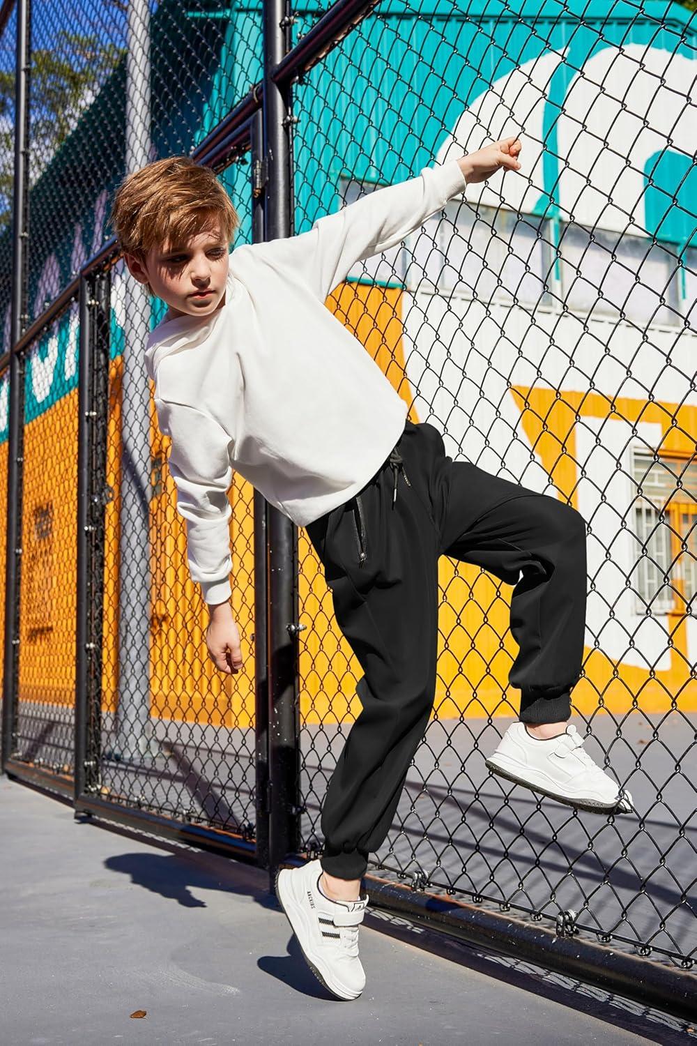 image:imageArshiner Boys Casual Pants Elastic Waist Drawstring Kids Pants Youth Tapered Sweatpants Zipper Pockets Black