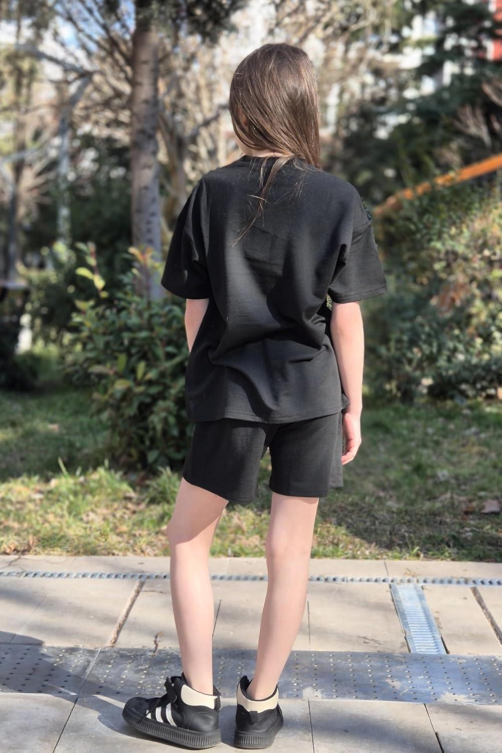 image:imageArshiner Girls 2 Piece Outfits Summer Clothes Short Sleeve Tops and Short with Pockets Kids Fashion Clothing SetsBlack