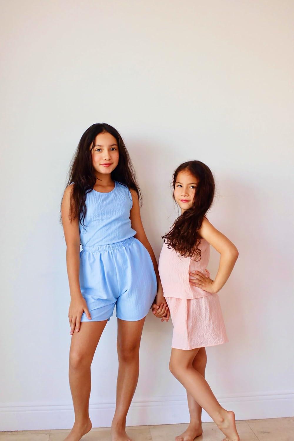 image:imageArshiner Girls Summer 2 Piece Outfit Sleeveless Top and Paperbag Waist Shorts with Pockets Kids Shorts Set Ages 513Light Pink