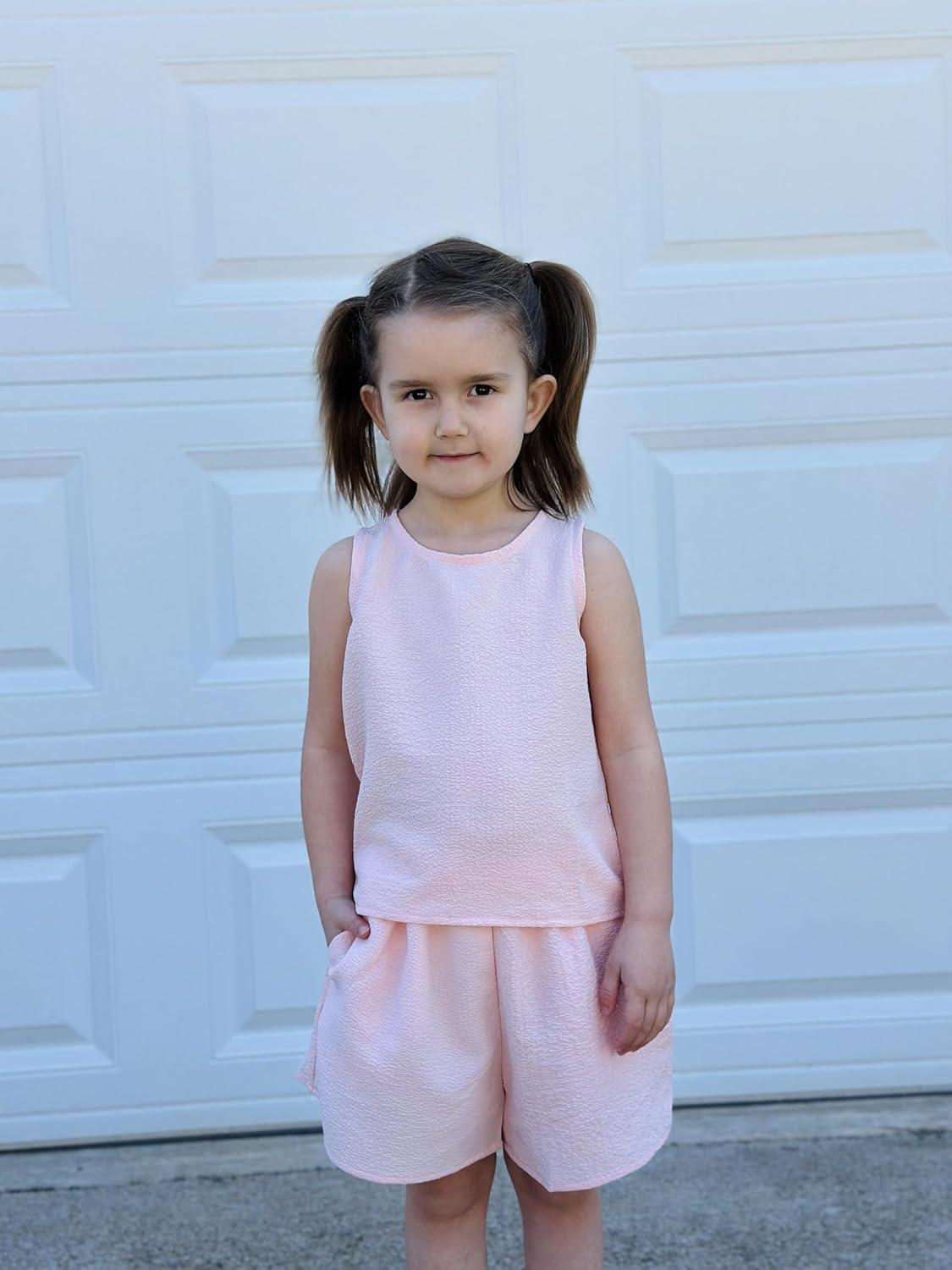 image:imageArshiner Girls Summer 2 Piece Outfit Sleeveless Top and Paperbag Waist Shorts with Pockets Kids Shorts Set Ages 513Light Pink