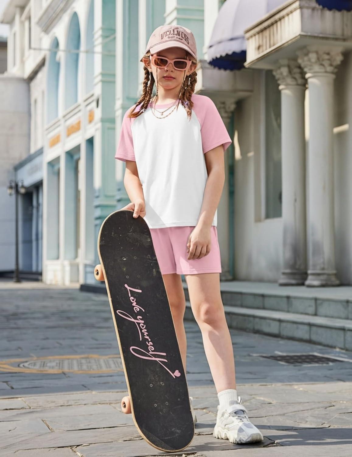 image:imageArshiner Girls 2 Piece Outfits Summer Clothes Fashion Short Sleeve Pullover Tops and Shorts with Pockets Kids Clothing SetLight Pink
