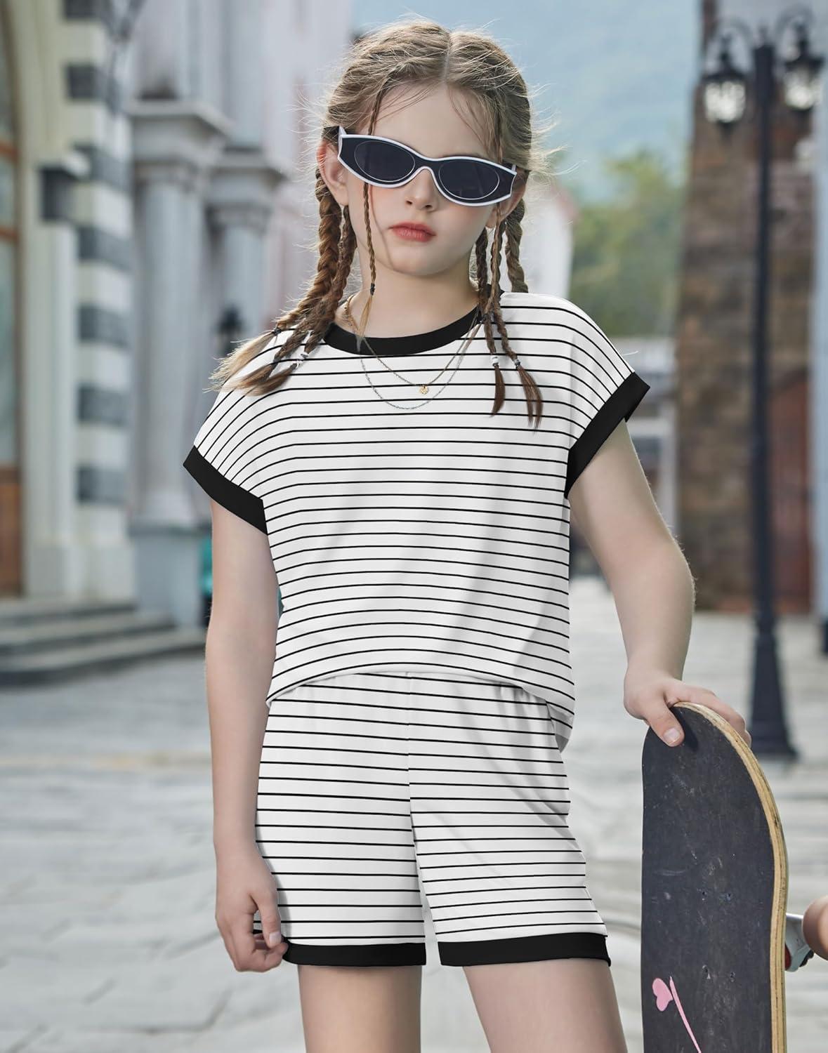 image:imageArshiner Girls Summer 2 Piece Outfits Short Sleeve T Shirts Top and Shorts Clothing Sets with PocketsBlack and White Stripes